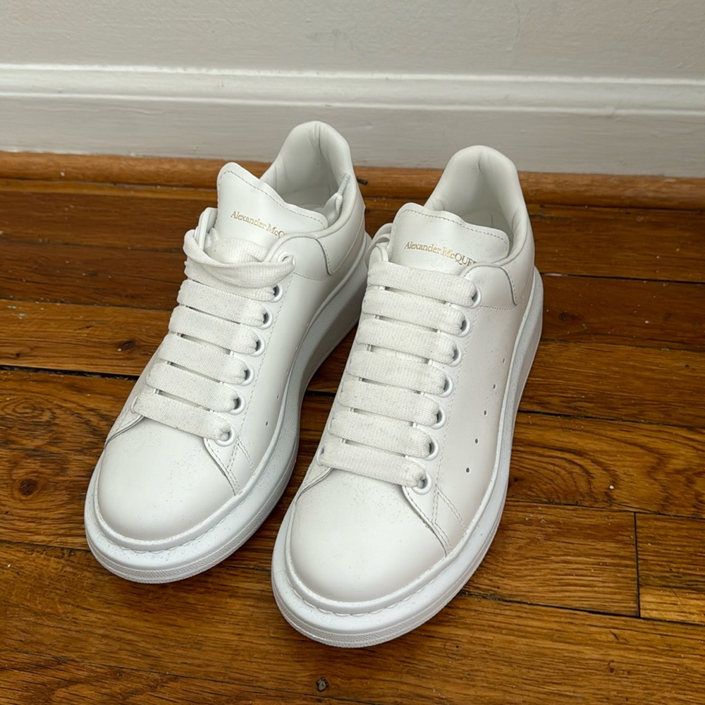 Alexander Mcqueen Leather exaggerated-sole sneakers in white